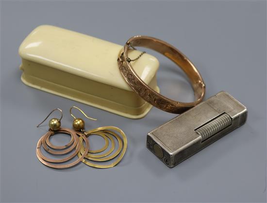 A seed pearl set 15ct gold tiepin, a silver Dunhill cigarette lighter, a 9ct gold bangle and a pair of hoop earrings